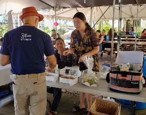 Lu Jin at the Hogan Marketplace