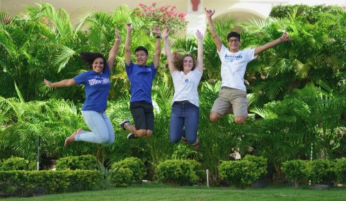 Students jumping in celebration