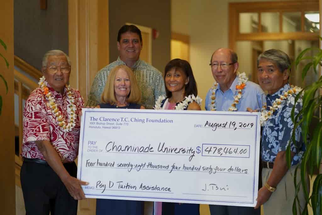Group picture receiving check from Clarence T.C. Ching Foundation to provide scholarships to students