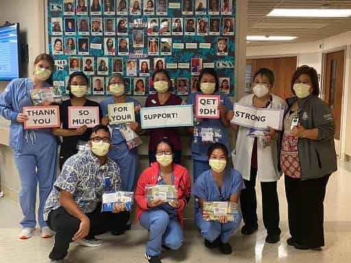 Queen's Medical Center's nurses and staff saying thank you to the HOSA Club for the care package donation