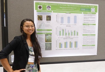 Nicole Yamase '14 showcasing her research at Chaminade's event in 2012