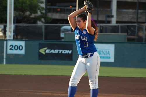 Luana Moreno, BA Religious Studies '17, playing softball for Chaminade