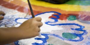elementary art education student painting