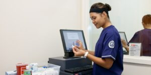 public health student doing lab work at Chaminade