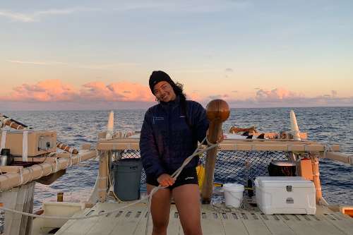 Lucy Lee '23, environmental studies major navigating on Hokulea