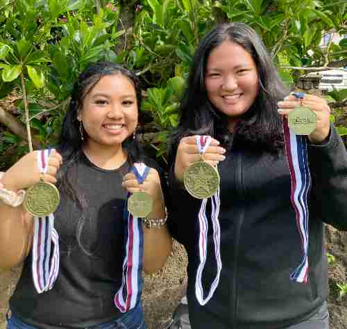 Aloha Lei Garo and Taylor Ishisaka with their first-place medals