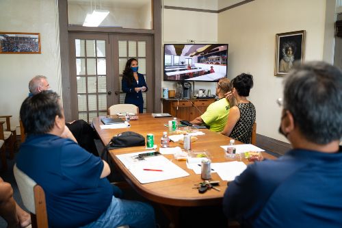 Kailani Torres (E+ID major) presenting her design to Sacred Hearts Academy