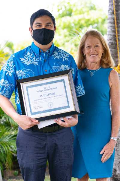 Dr. Rylan Chong posing with Dr. Lynn Babington
