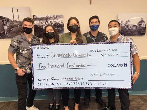 Washed Ashore with their $2500 check for winning the Silverswords Business Competition
