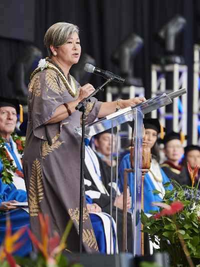 Suzanne Puanani Vares-Lum, president of the East-West Center, giving the commencement speech