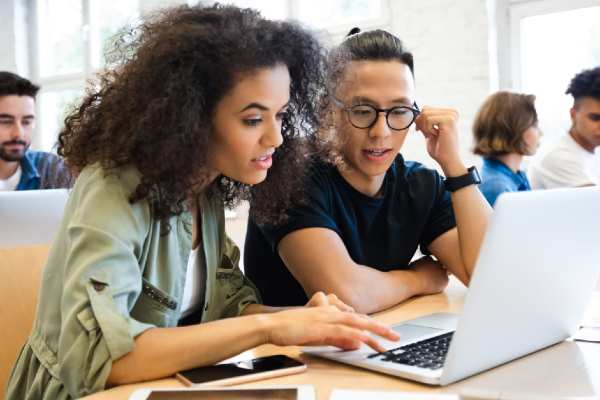 Classmates are learning through laptop