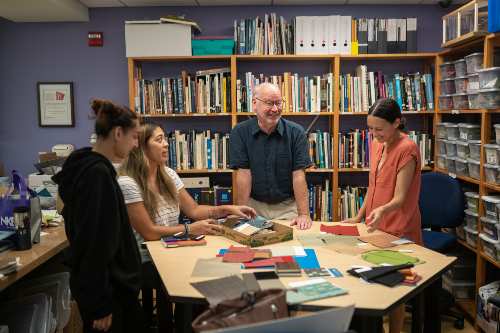 Matthew Higgins with students