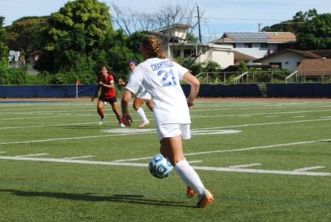Megan McClanahan playing soccer