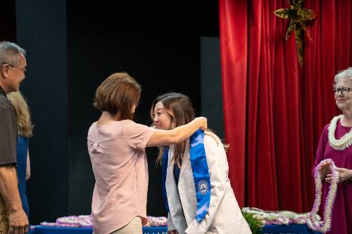 Nursing student receiving her stole at the Nursing Pinning ceremony