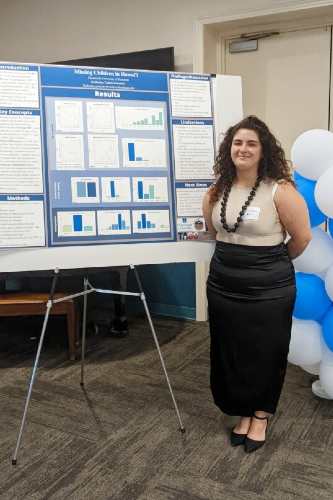 Katherine Gonzalez '23 with her poster