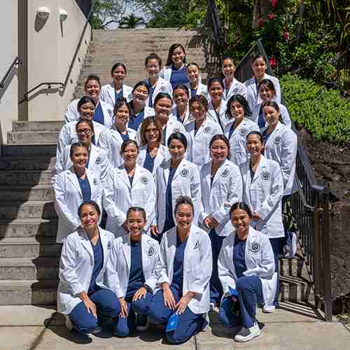 Sophomores received their white coats during an annual ceremony.