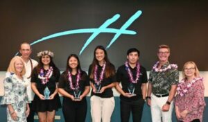 Drs. Roy Panzarella and Chaminade President Lynn Babington, and Christine and Glenn Hogan flank this year's Hogan Entrepreneurial Leadership Program Awardees.