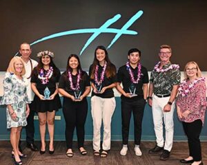 Drs. Roy Panzarella and Chaminade President Lynn Babington, and Christine and Glenn Hogan flank this year's Hogan Entrepreneurial Leadership Program Awardees, including from left. Waioli Misajon, Ciena Alagao, Faith Chang and Jacob Fernandez.