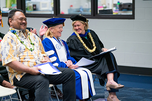 Drs. Janet Davidson and Lynn Babington share a light-hearted moment. Seated next to them is Mark Patterson, Chair Hawaii Correctional Oversight Commission and Hawaii Youth Correctional Facility, Warden.