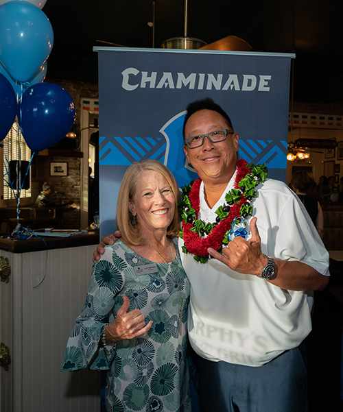 Chaminade President Dr. Lynn Babington and Baseball Head Coach Chad Konishi flash their shaka of approval.