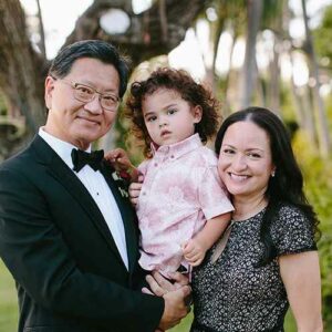 Dr. Thomas Shieh and Raven Shieh with their grandson.