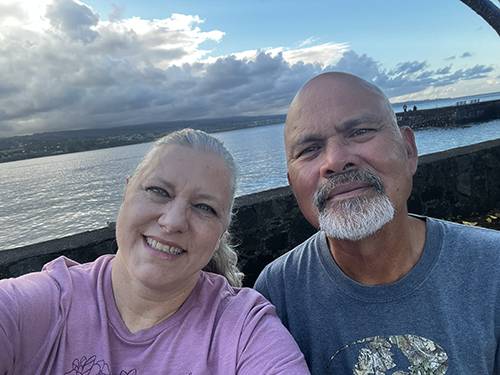 Angie and Albert Cabreira pose for a selfie.
