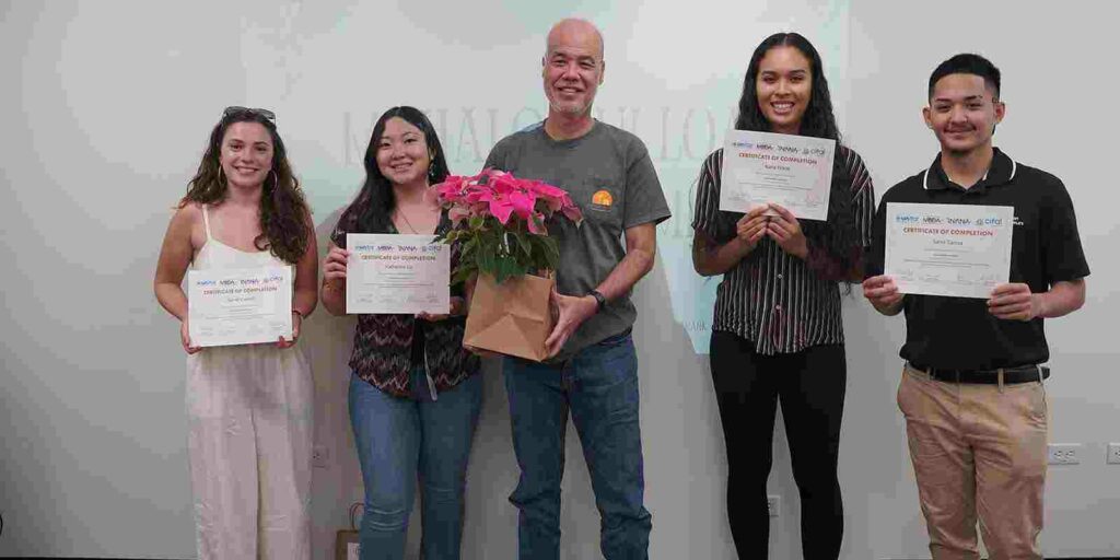 Re-use Hawaii's Workforce Development Coordinator Nathaniel Pak saw value in Chaminade student's sustainable efforts for the nonprofit. Team members included, from left, Sarah Carroll '25, Katherine “Kat” Liu ’26, Kaila Frank ’24 and Sano Tanna ’24.