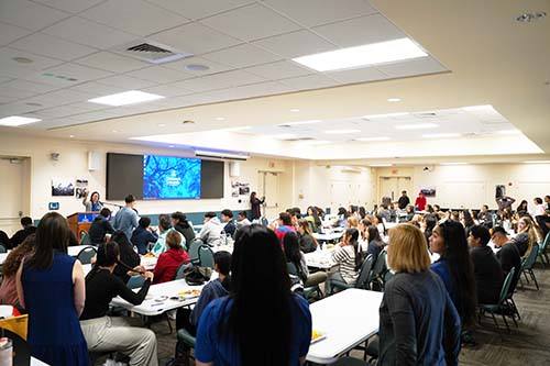 Chaminade’s Early College Director, Kim Baxter, addressed the students at the T.C. Ching Conference Center in Eiben Hall before they set off to visit other campus locations.