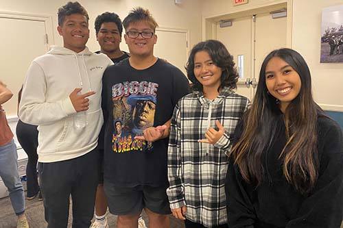 Saint Louis and Kapaa High School students mingled during the Early College Summit.