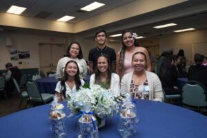 Scholarship Luncehon attendees include, standing from left, Janice Glade, Peter Jan Ramos and Anastasia Tangatailoa, and seated from left, Leila Casison, Caitlin Bocobo and Paige Garcia.