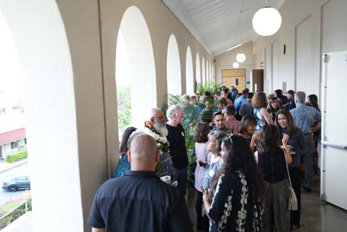 Attendees mingled outside Ching Hall during the cocktail reception.