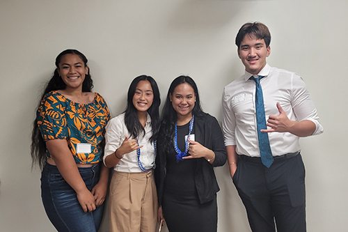 Nanakuli sophmore Saeota Fanuaea, far left, poses with Maryknoll School students, including senior Kainalu Szewczyk.