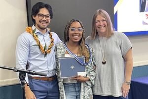 Andrew Anchetta and Allison Jerome with junior Tyanna Hemmings ’25 winner of the Bro. Joseph Becker Award of Excellence.