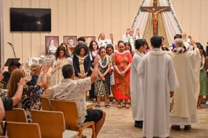 Graduating students are honored during the Baccalaureate Mass at Mystical Rose Oratory.