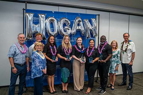The Hogans and Drs. Lynn Babington and Roy Panzarella pose with this year's awardees, including, from left, Waioli Misajon, Leah Carrington, Liz Devine, Yazmine Esquivel and Voris Crooms.