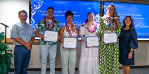 Flanked by School of Business and Communication Interim Dean and Assistant Dean, Annette Santos and Asoke Datta, Festival of Award honorees included, from left, Taisyn Kauhaahaa, Gabriela Galarza, Liz Devine and Lisa Trumbull.