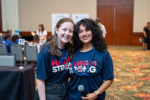 Seniors, from left, Liz Devine and Gabriela Galarza were among Chaminade student volunteers.