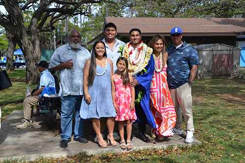 Ryan Chang poses with family members, including his grandfather, siblings and mom and dad, Shanmarie and Paul Alferez, far right.