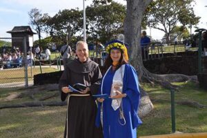 Franciscan Friar James Seiffert came to support longtime friend former United Airlines colleague Ana Giliberti.