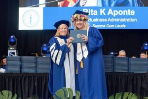 Rita Aponte, Senior Manager at Bank of Hawai‘i’s People Service Center, received her degree in Business Administration from Chaminade University on Saturday evening.