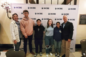Wera Panow-Loui and Dr. Eddie Merc were mentors to students, from left, Ross Reeves, Alexander Hernandez, Liz Devine and Kelsey Sablan.