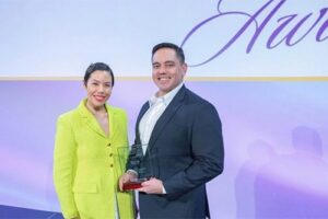 Lesley-Anne Guerrero and Bank of Guam president and CEO Joaquin P. L.G. Cook accepted national recognition by the American Bankers Association Foundation with a Community Commitment Award for its efforts in financial literacy.