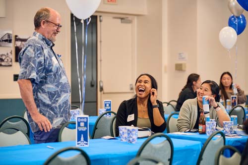 Dr. Dale Fryxell shares a laugh with recent alumunae.