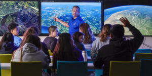 Dr. Mark Speck teaches students about the importance of geographic information systems.