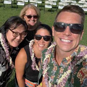 Chaminade faculty and staff members attended Kauai High School Graduation. They included, from front, Dr. Travis Mukina, Kim Baxter, Jill Higashi and Dr. Janet Davidson.
