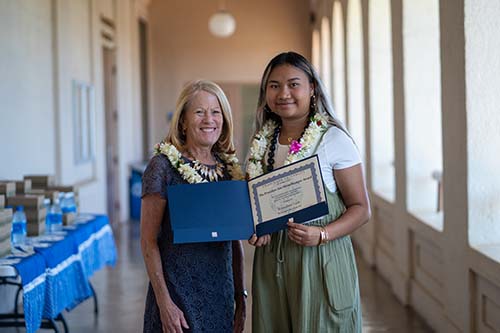 Chaminade President Dr. Lynn Babingto presented Kawailani Luat with her President Sue Wesselkamper Award during last year's Na Liko Na’auao.