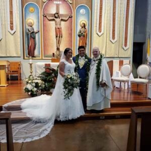 Fr. George Cerniglia (former rector at Chaminade) officiated the wedding of Clarke Antonio and Vanessa Ignacio.