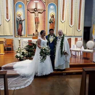 Fr. George Cerniglia (former rector at Chaminade) officiated the wedding of Clarke Antonio and Vanessa Ignacio.