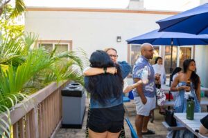 Alumna embraced each other as they arrived for the Mini Reunion.