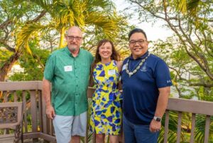School of Education and Behavioral Sciences Dean Dale Fryxell and Bro. Allen A. Pacquing, SM, flank alumna Dr. Brandy Sato BA '97, MEd '03.